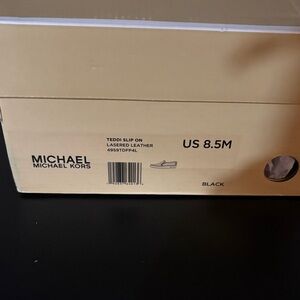 Michael Kors Black Teddi Leather Slip-Ons